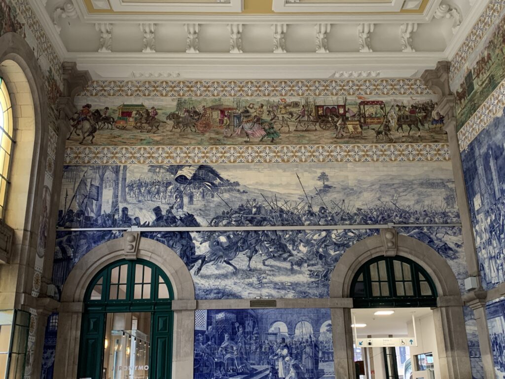 Closer view of painted tiles in Sao Bento train station. Battle of Valdevez and the presentation by Egas Moniz of his children to King Alfonso VII of Leon and Castile.